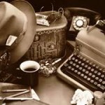 macchina da scrivere, cappello e tazza di caffè